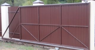 Купить откатные ворота из профнастила Новый Уренгой, цена от 1762 руб.